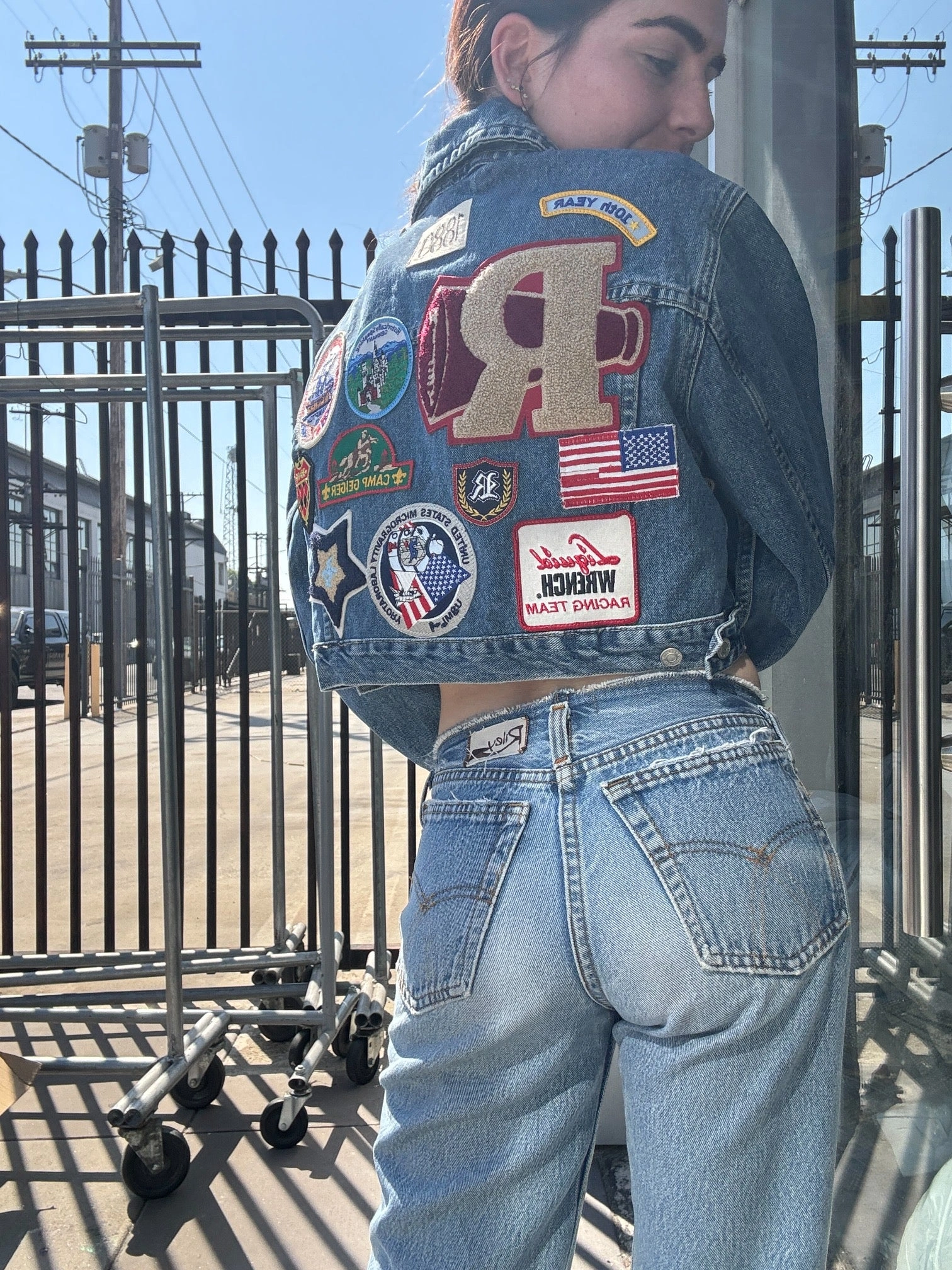 Get Your Grunge On: Vintage Patched Denim Trucker Jacket – Cool & Unique!